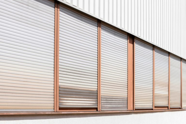 Shutters,On,A,Wall,,Windows,On,A,Metal,Wall,,Closed